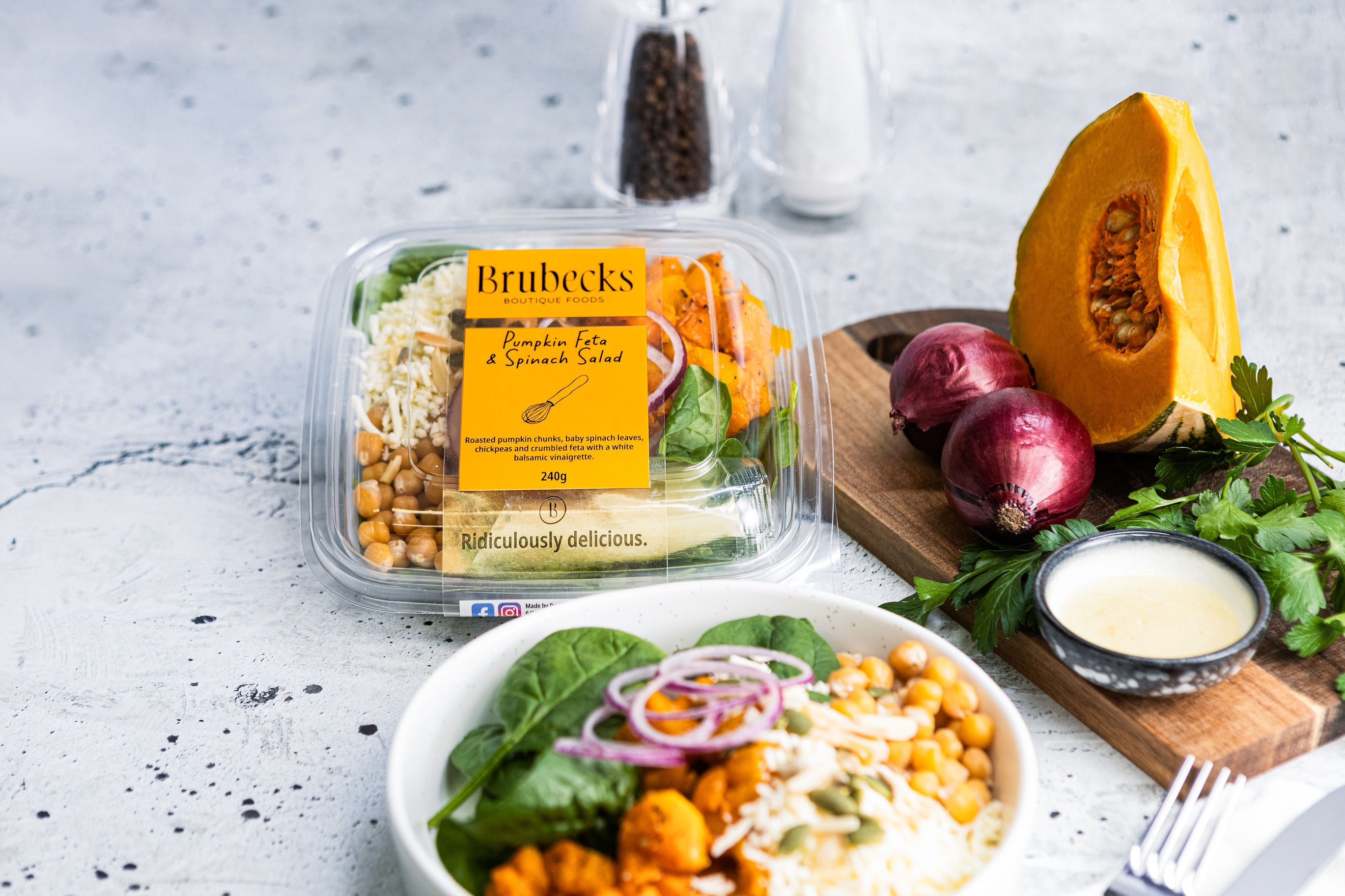 Brubeck's salad packaging with ingredients on a table