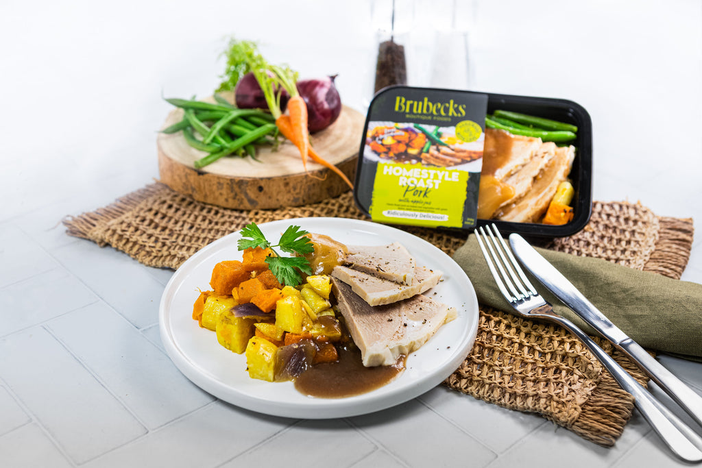 Plated meal with Brubecks packaging on a white surface