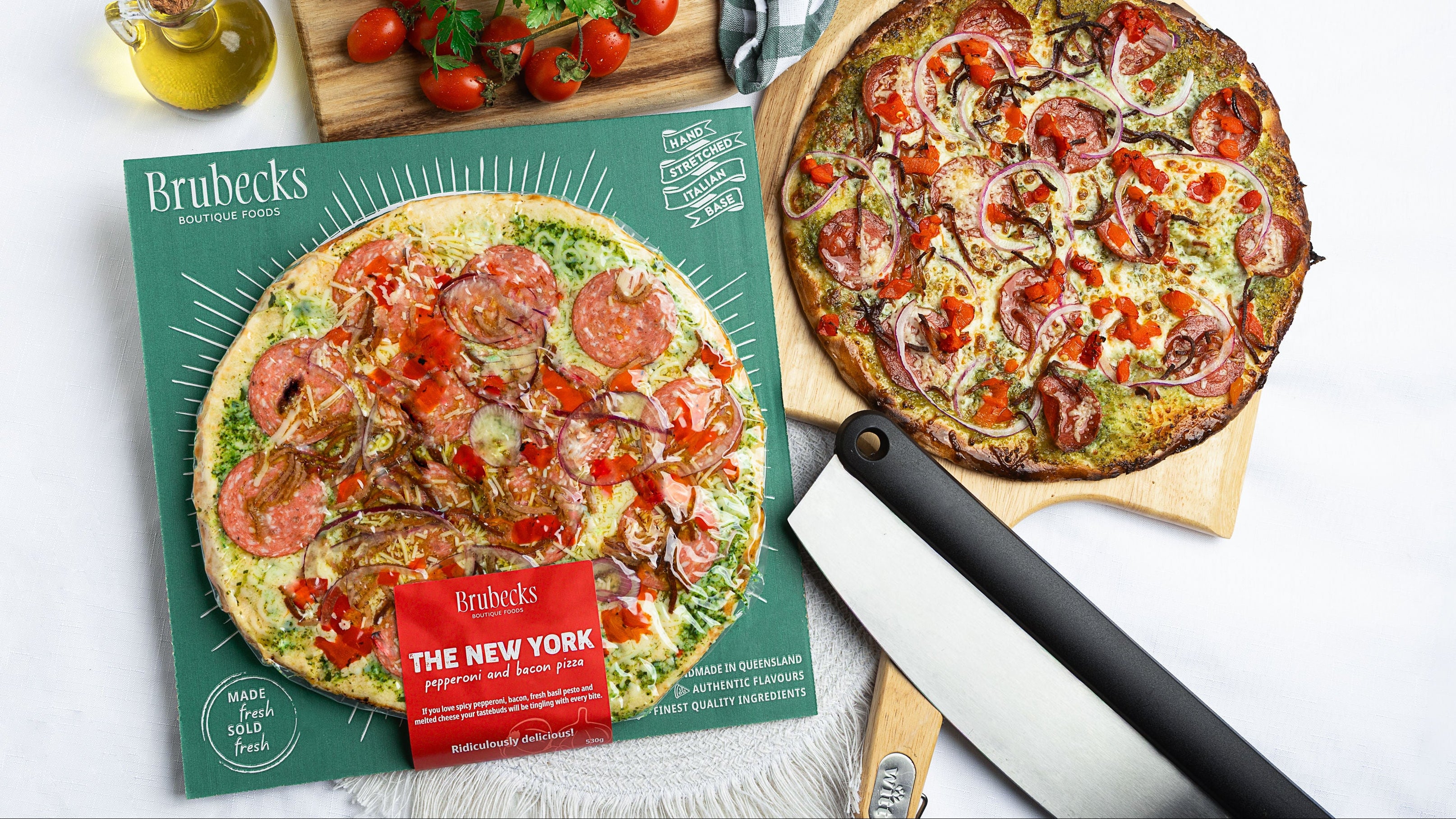 Brubeck's pizza with ingredients and packaging on a white surface