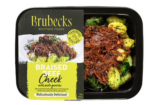 Brubecks Braised Beef Cheek dish with vegetables on a black tray