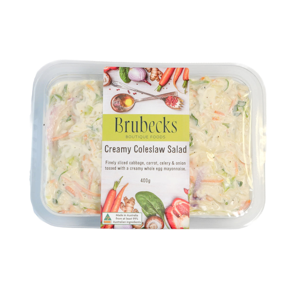 Packaged creamy coleslaw salad with Brubecks label on a white background